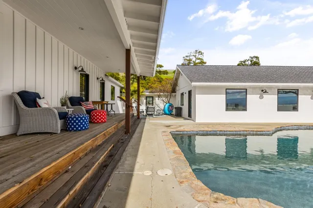 a view of outdoor space and swimming pool