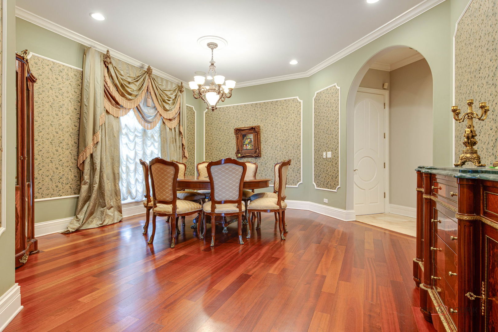 300 Red Oak Road Northbrook, IL 60062 - Photo 13 of 40 a view of a dining room with furniture and wooden floor