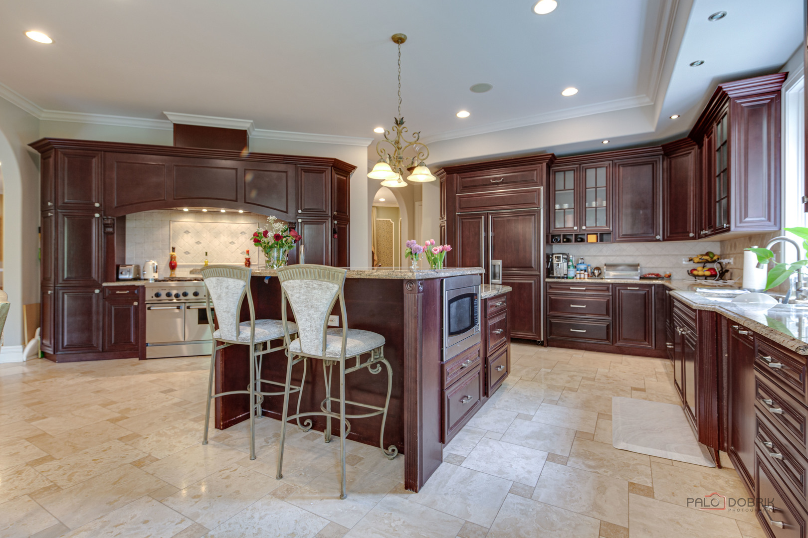 300 Red Oak Road Northbrook, IL 60062 - Photo 16 of 40 a kitchen with kitchen island granite countertop lots of counter top space