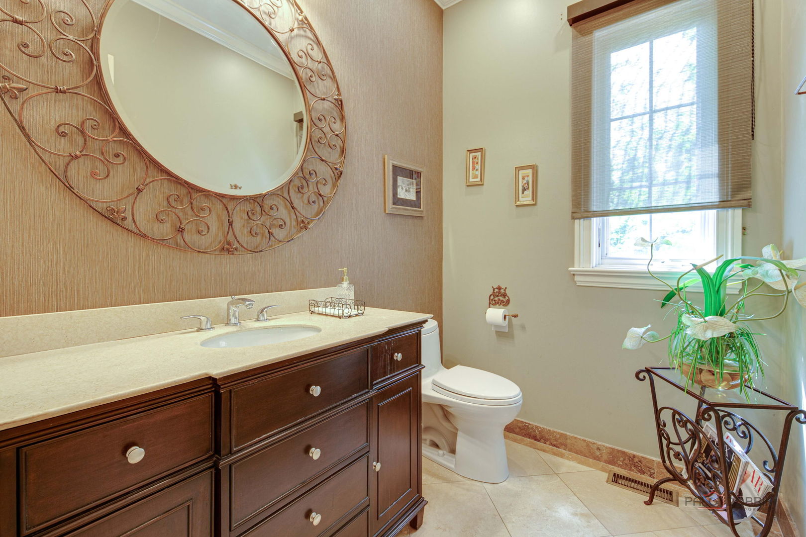300 Red Oak Road Northbrook, IL 60062 - Photo 23 of 40 a bathroom with a granite countertop toilet sink and mirror