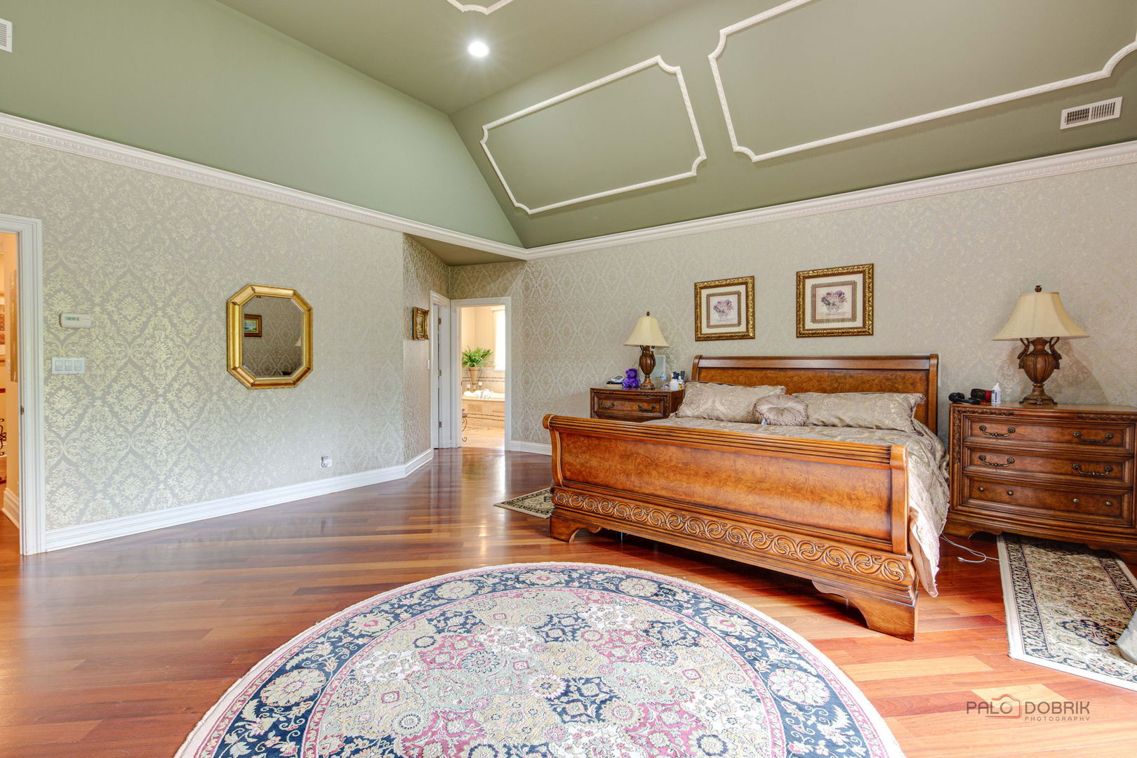 300 Red Oak Road Northbrook, IL 60062 - Photo 29 of 40 a bedroom with a bed and wooden floor