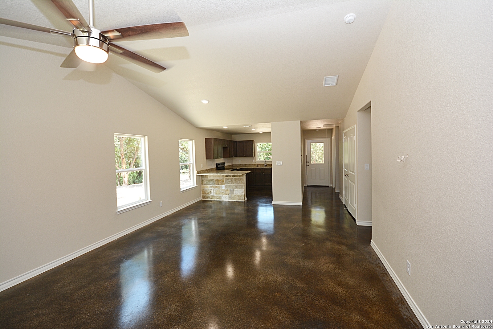 641 Turkey Canyon Drive Spring Branch, TX 78070 - Photo 2 of 11 a view of a kitchen with a sink and a window