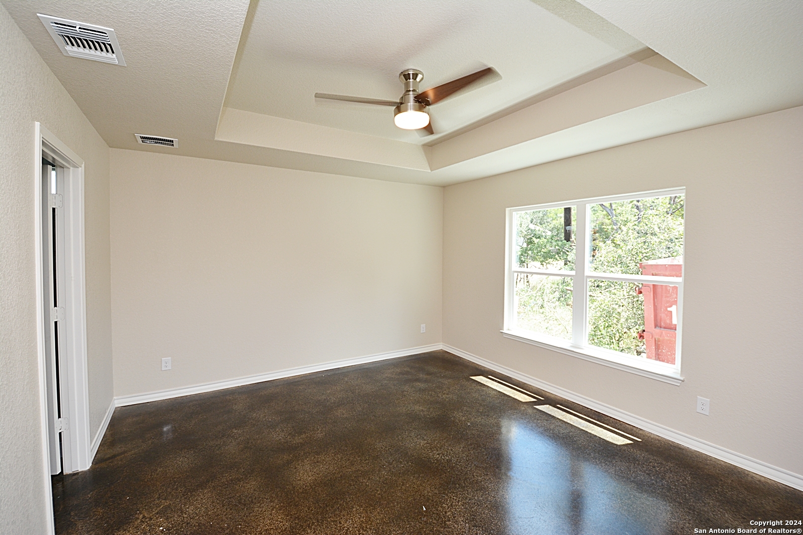 641 Turkey Canyon Drive Spring Branch, TX 78070 - Photo 5 of 11 a view of an empty room with a window