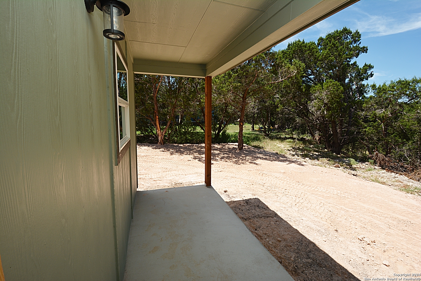 641 Turkey Canyon Drive Spring Branch, TX 78070 - Photo 10 of 11 a view of a yard
