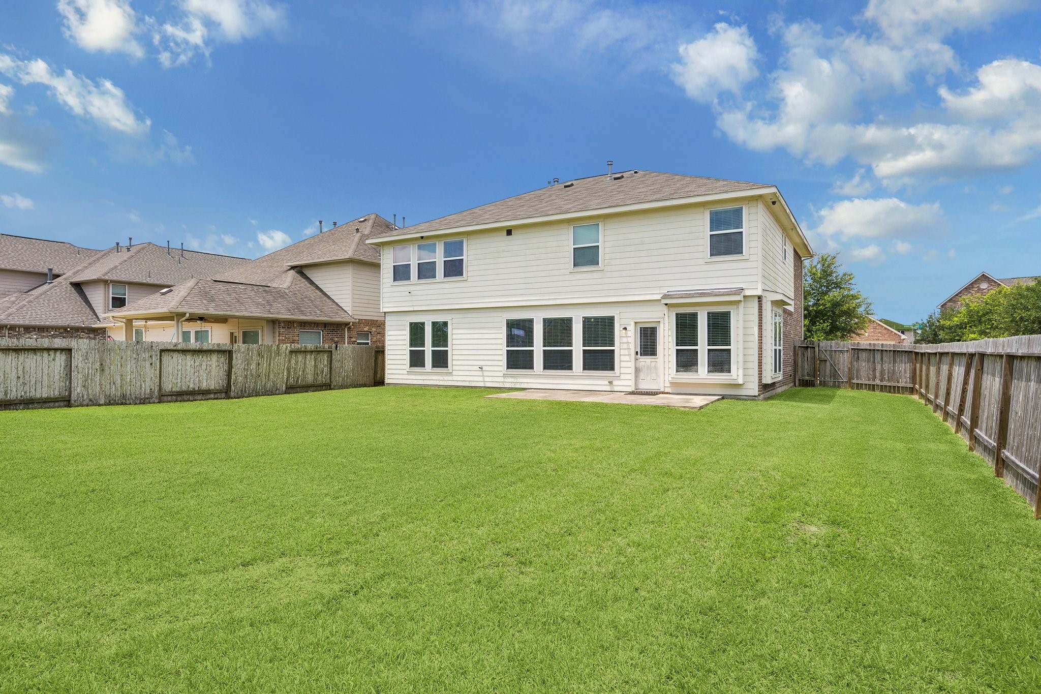 9707 Shimmering Lakes Drive Rosharon, TX 77583 - Photo 15 of 15 a view of an house with backyard space and balcony