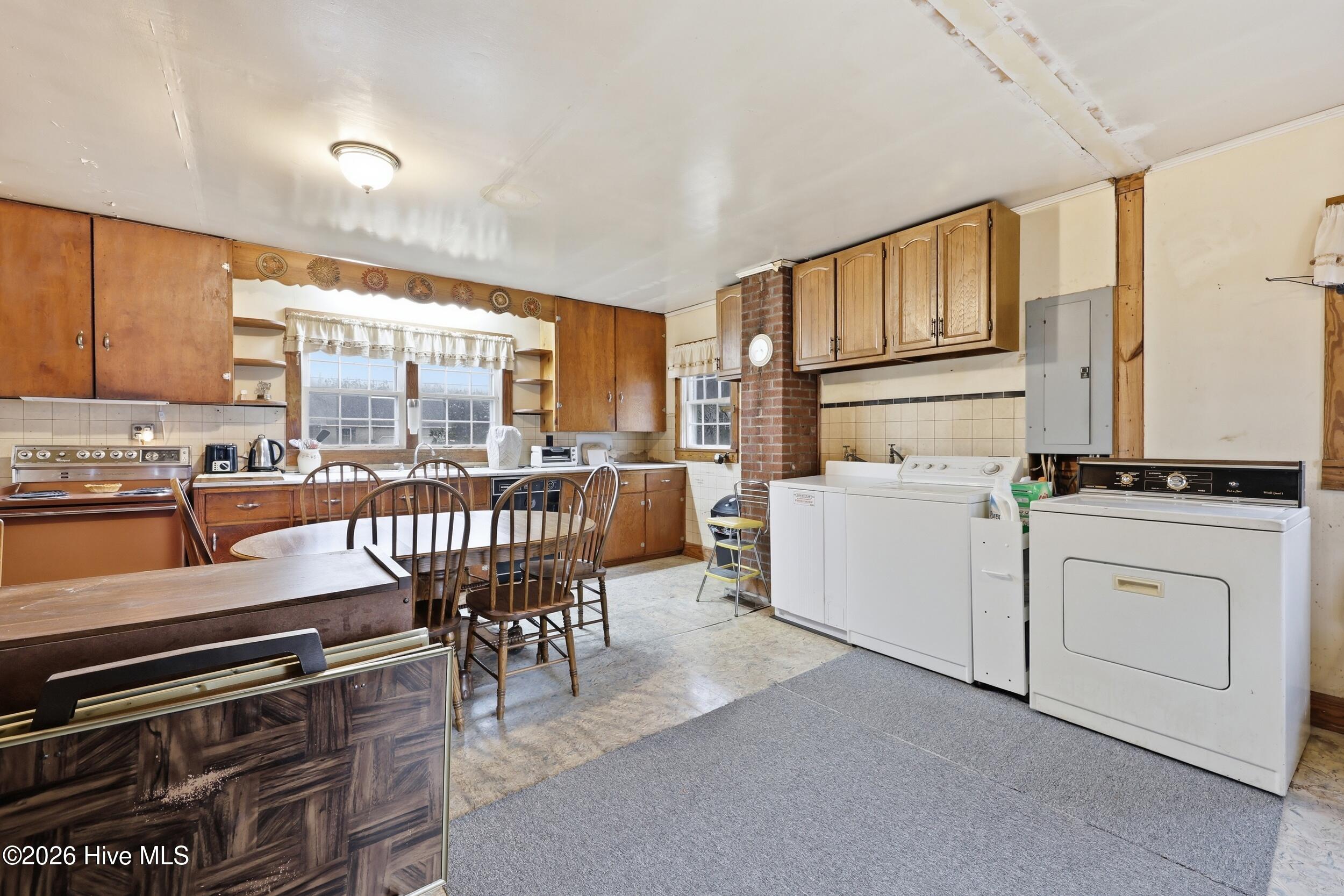 2407 Peartree Road Elizabeth City, NC 27909 - Photo 5 of 34 2407 Peartree Road kitchen and utility a