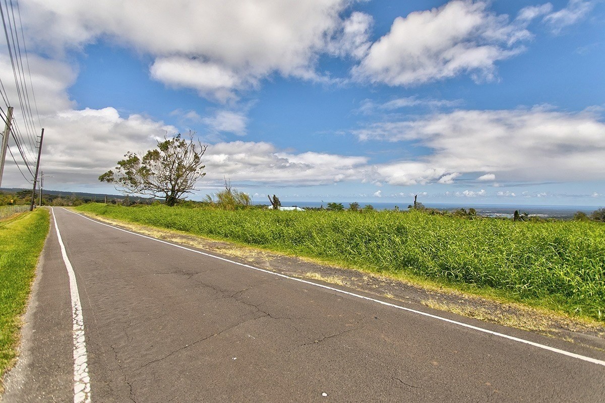 4 Lot Hilo, HI 96720 - Photo 11 of 11 a view of a pathway both side of grassy field with shrub