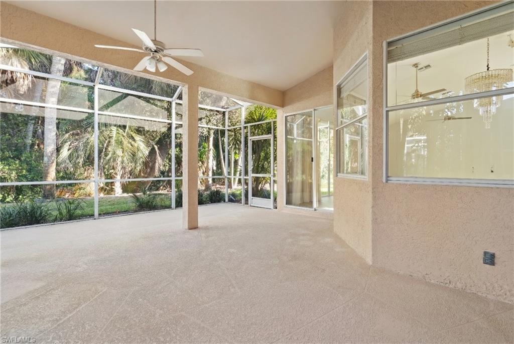 20751 Rivers Ford Estero, FL 33928 - Photo 14 of 36 Unfurnished sunroom with a patio area and a ceiling fan