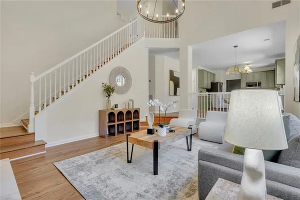 a living room with furniture and a table
