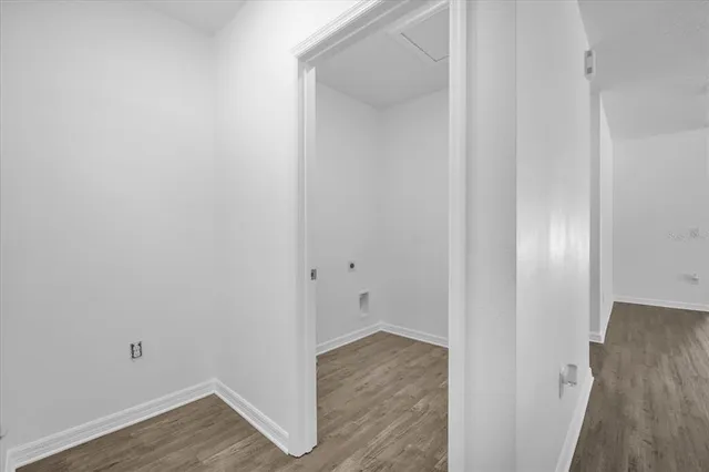 a view of small space with wooden floor