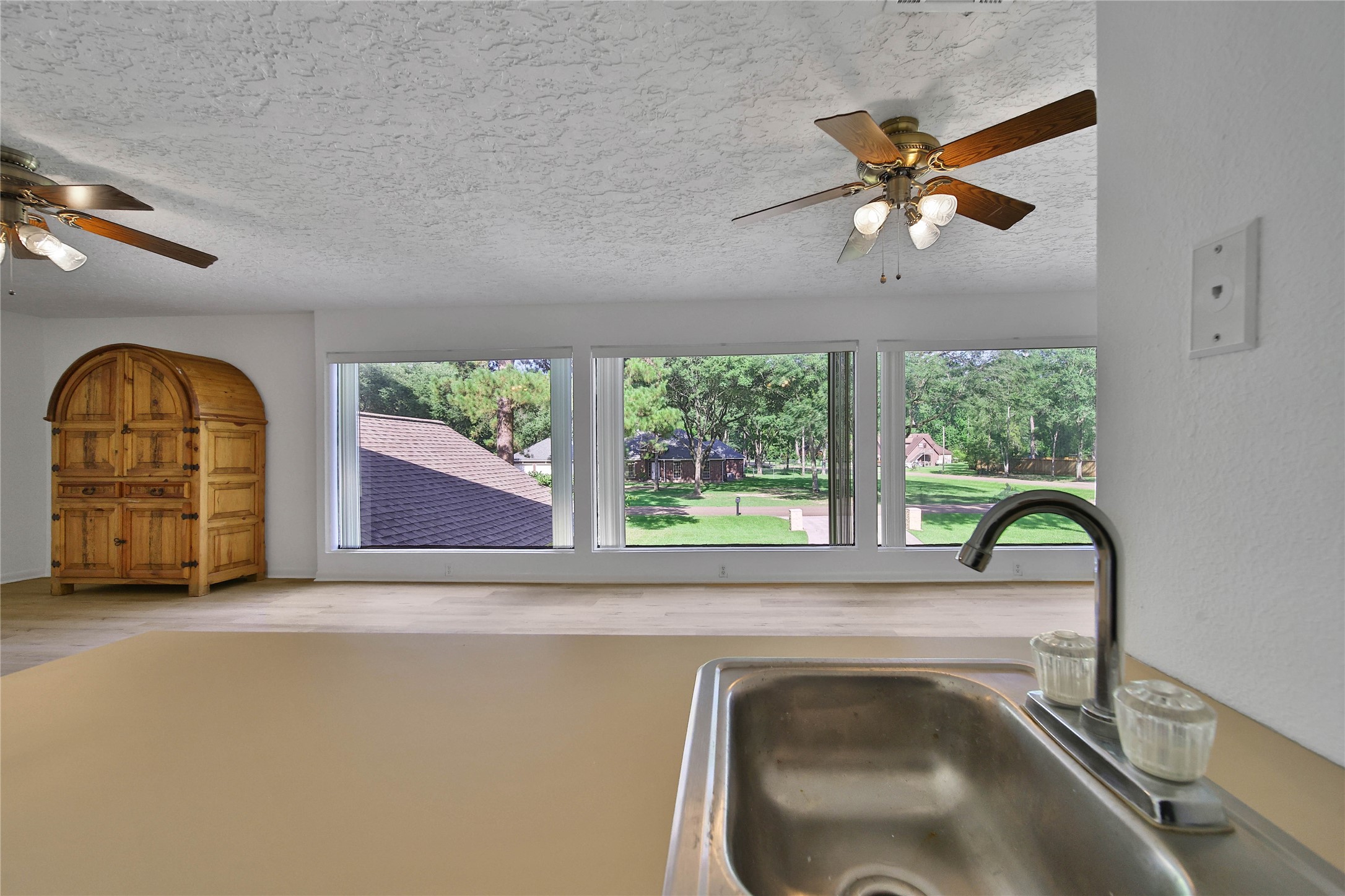 15418 Willis Way Conroe, TX 77384 - Photo 36 of 41 View from the wet bar in the upstairs gameroom