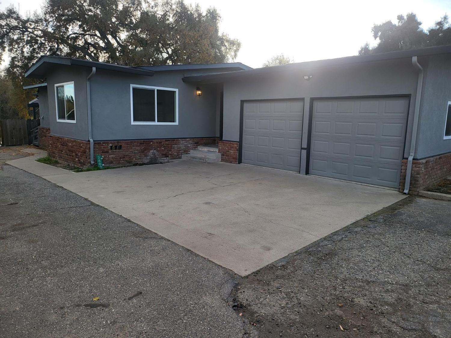 2800 Paradise Road Modesto, CA 95358 - Photo 1 of 1 a house with a outdoor space