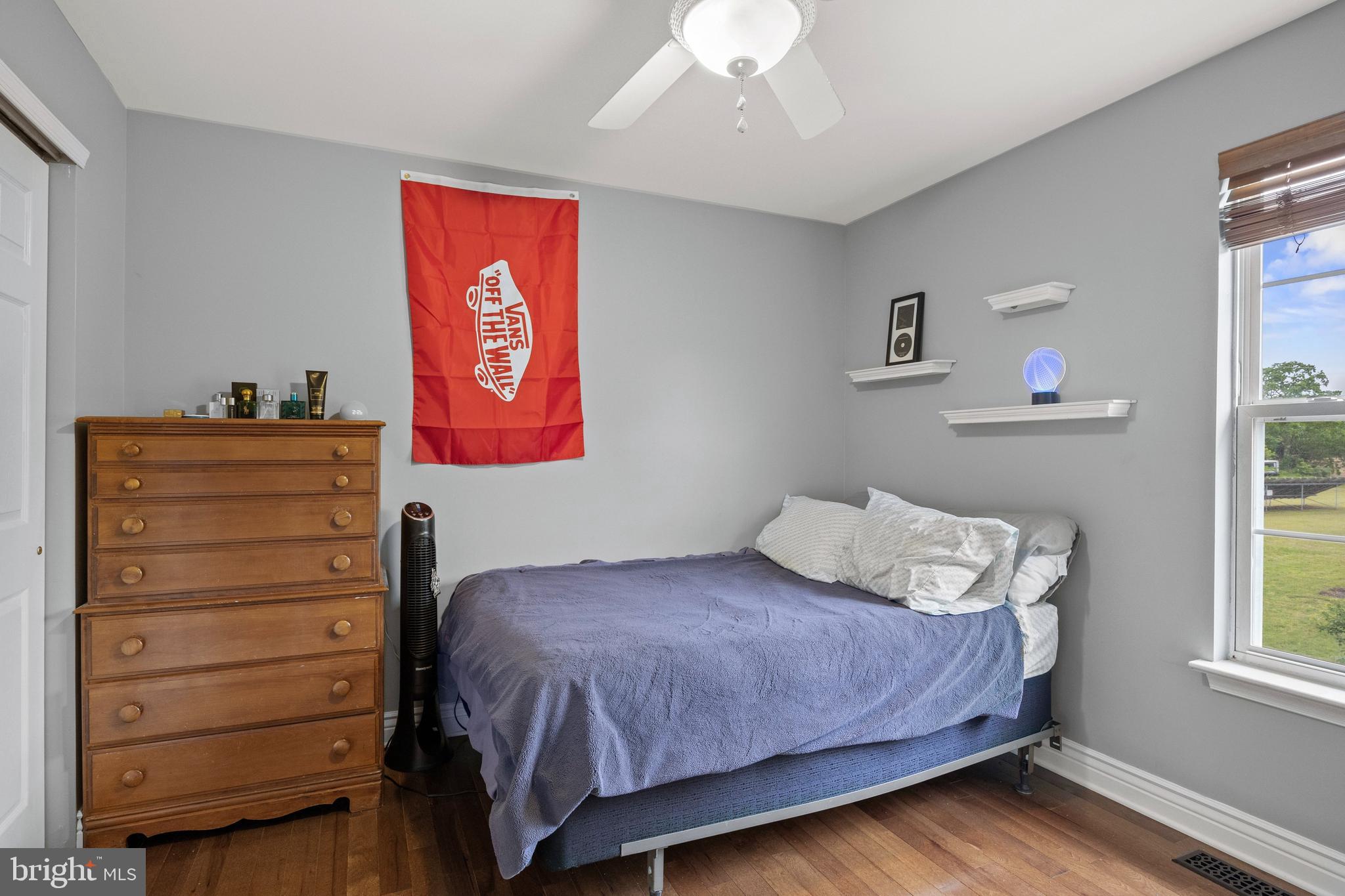 545 Lawrence Corner Road Pittsgrove, NJ 08318 - Photo 20 of 43 a bedroom with a bed and a window