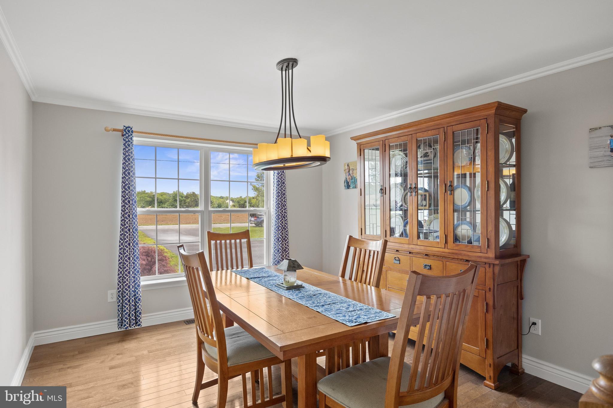 545 Lawrence Corner Road Pittsgrove, NJ 08318 - Photo 7 of 43 a dining room with furniture window and wooden floor