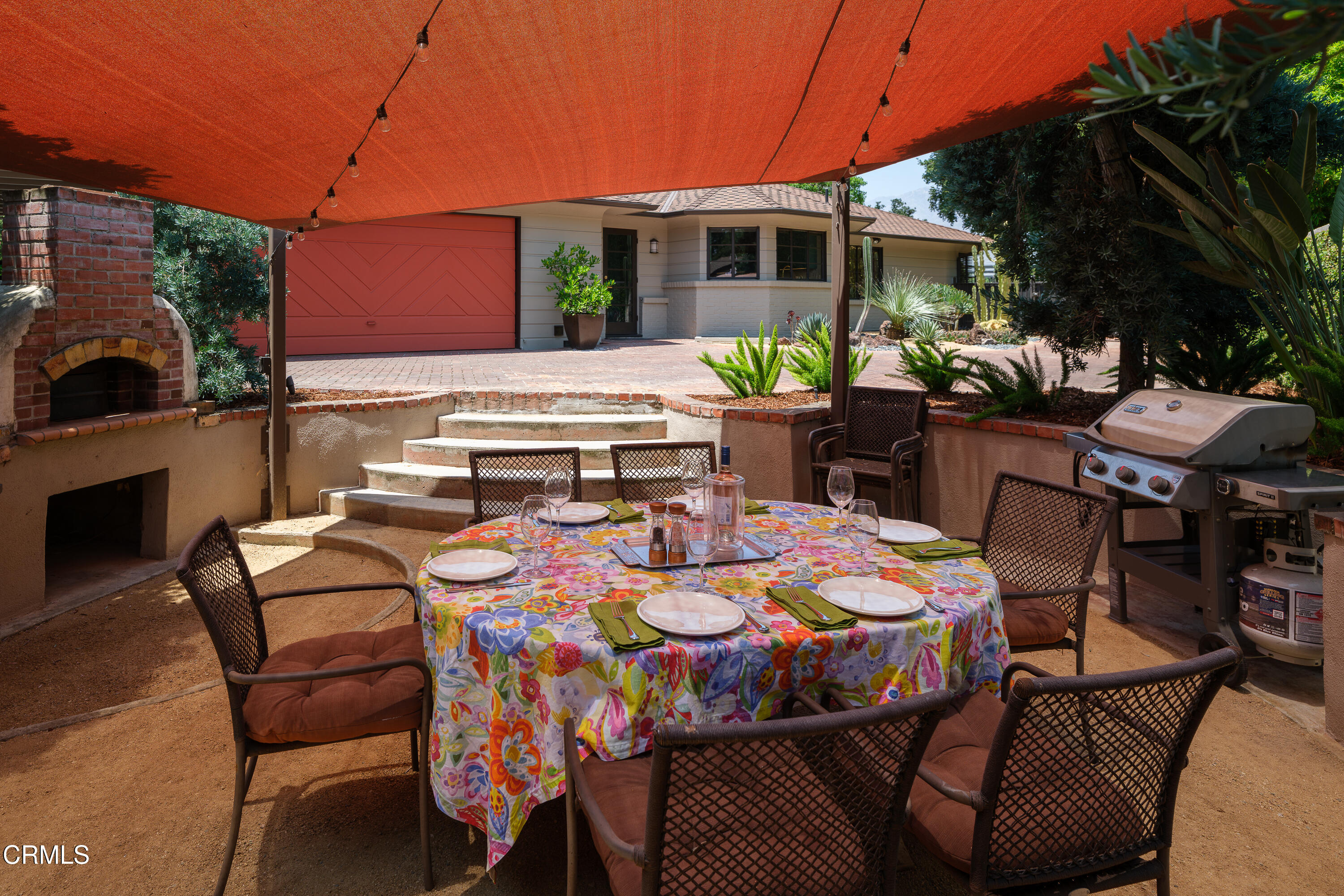 3312 Thorndale Road Pasadena, CA 91107 - Photo 43 of 48 a outdoor space with patio couches and a fireplace