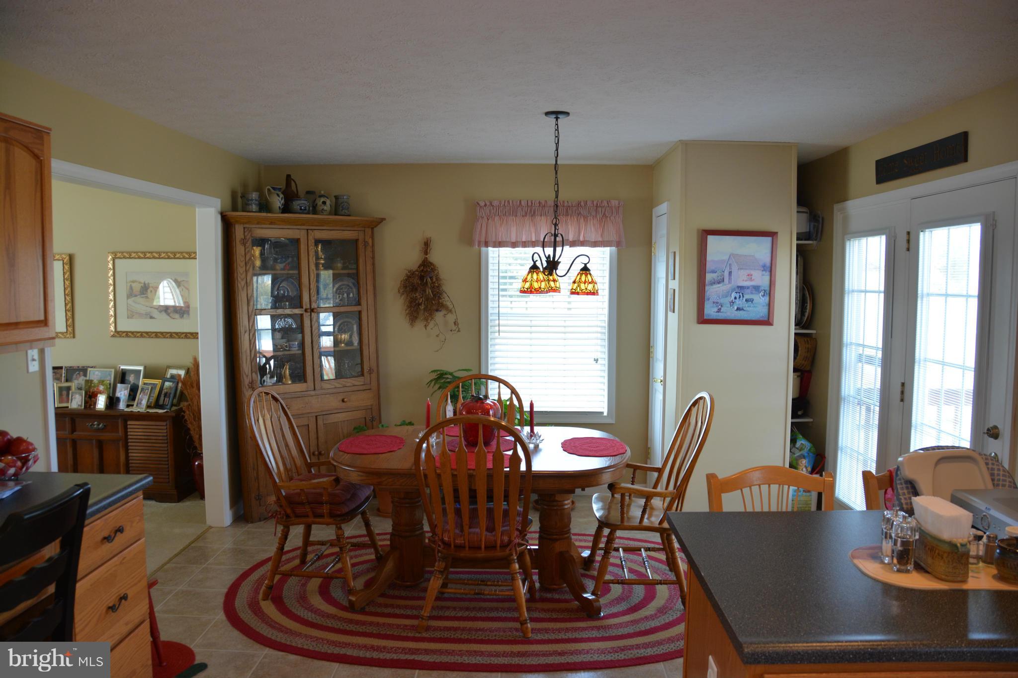 4341 Apple Pie Ridge Road Winchester, VA 22603 - Photo 22 of 30 Dining area with access to rear deck