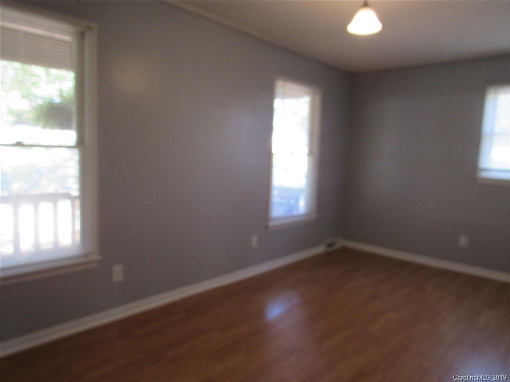 1226 Howards Creek Mill Road Vale, NC 28168 - Photo 15 of 22 an empty room with a window