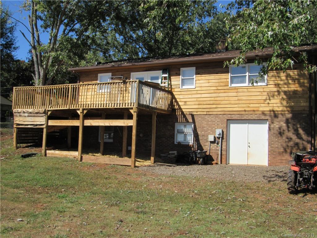 1226 Howards Creek Mill Road Vale, NC 28168 - Photo 19 of 22 a view of a house with a backyard