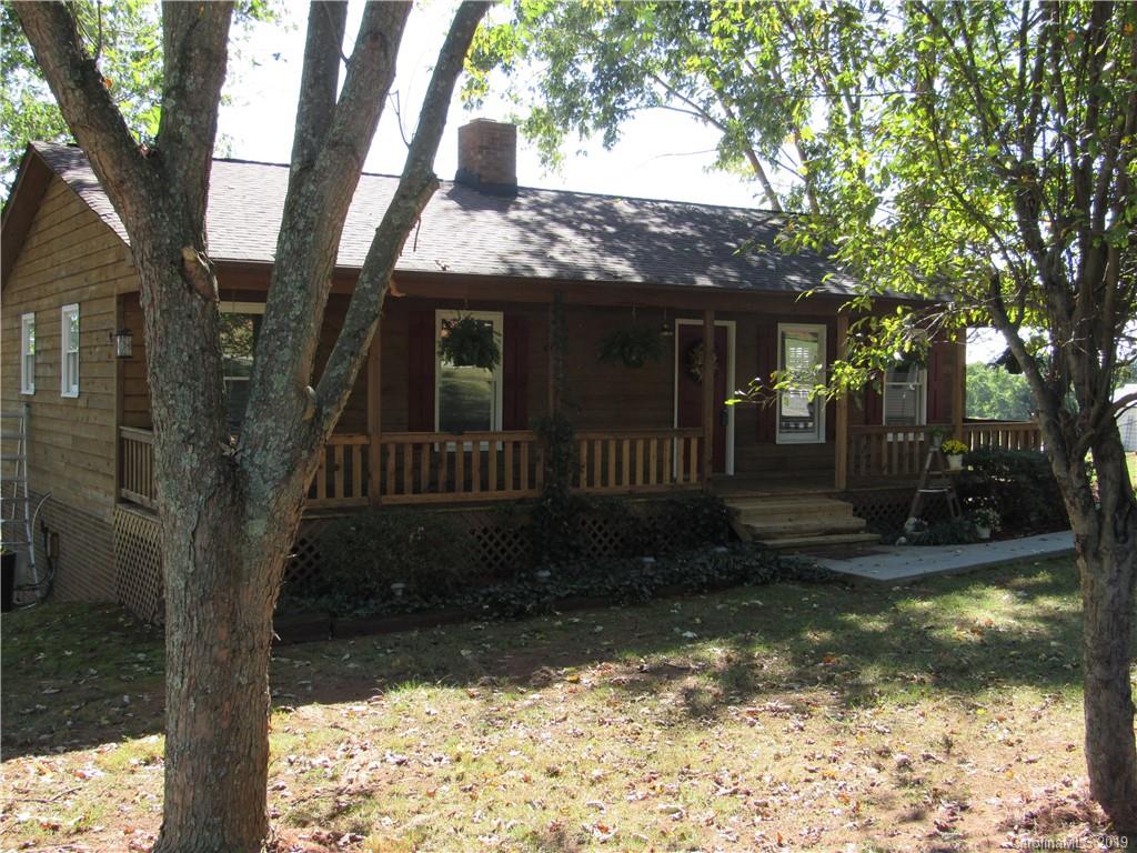 1226 Howards Creek Mill Road Vale, NC 28168 - Photo 20 of 22 a view of a house with a yard