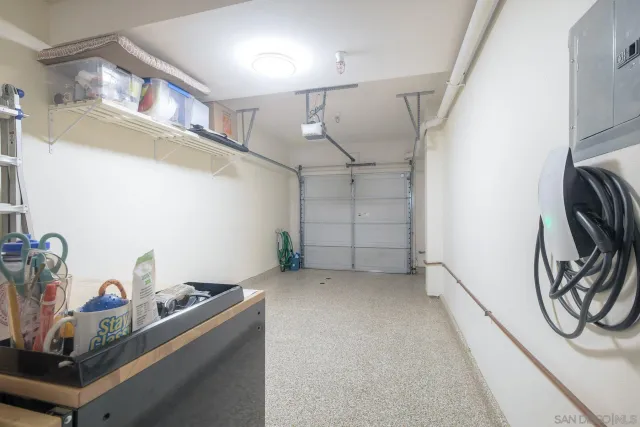 a room with gym equipment and windows