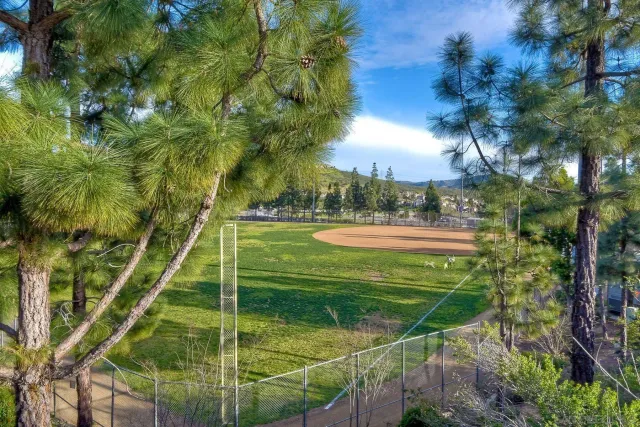 a view of a building with a sign on the wall