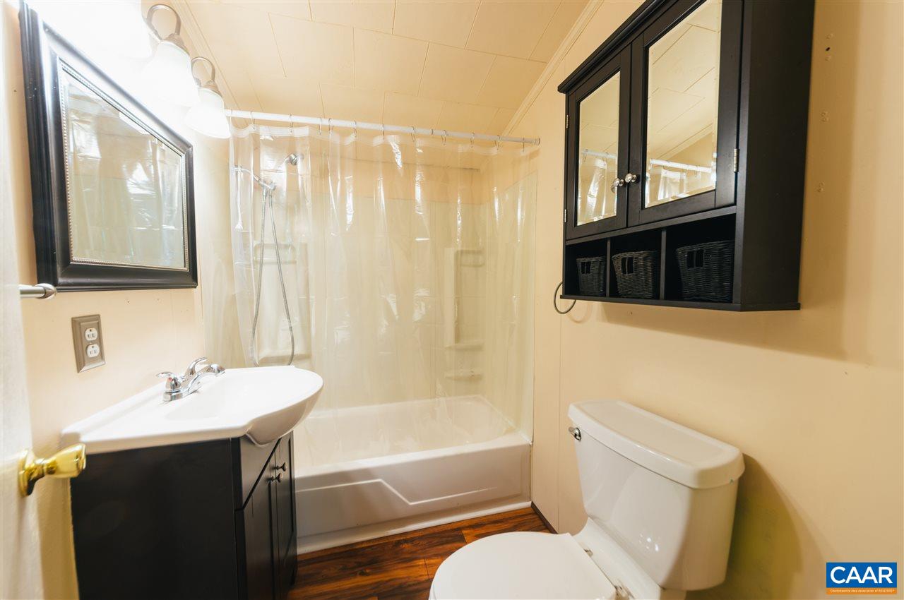 1614 Good Hope Church Road Aroda, VA 22709 - Photo 15 of 32 a bathroom with a sink toilet and shower
