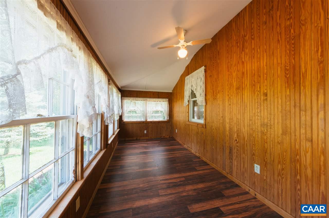 1614 Good Hope Church Road Aroda, VA 22709 - Photo 4 of 32 a view of a hallway with wooden floor and staircase