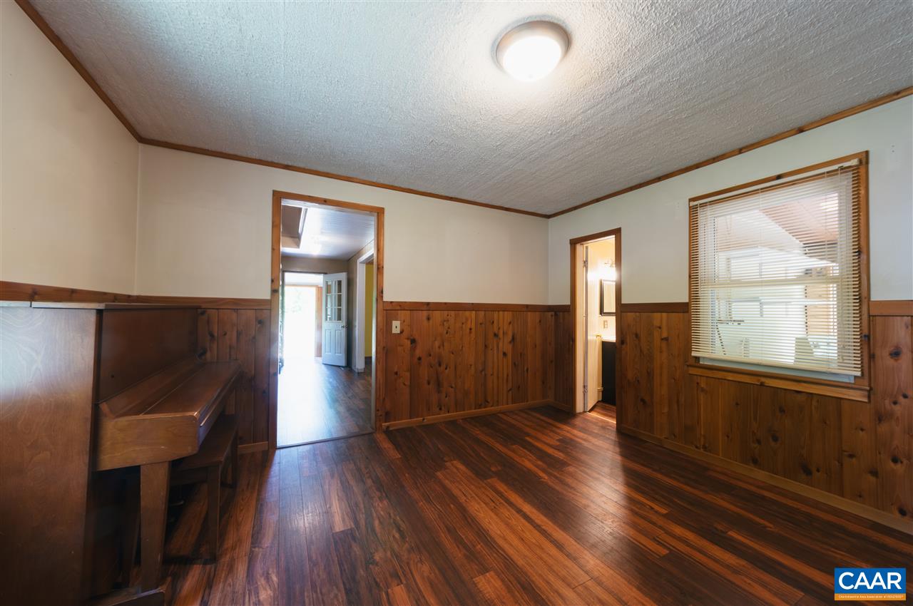 1614 Good Hope Church Road Aroda, VA 22709 - Photo 9 of 32 wooden floor in an empty room with a window