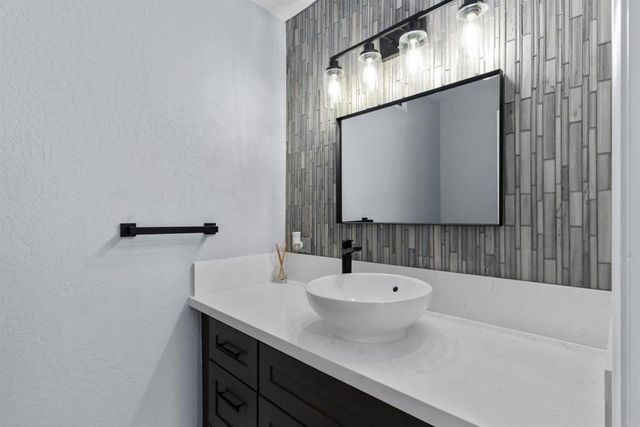 a front view of a house with a pathway