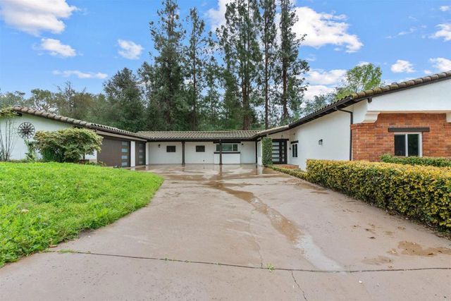 a outdoor dining space with furniture