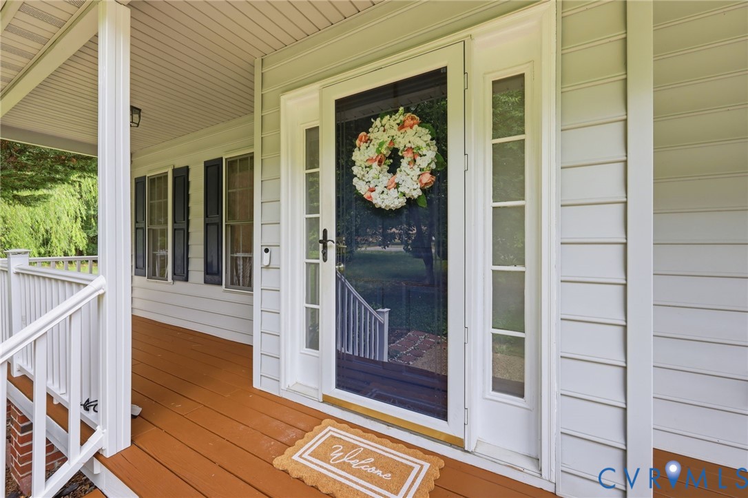 4180 Innesbrook Road Glen Allen, VA 23060 - Photo 50 of 54 Covered front porch with white railings, a brown-s