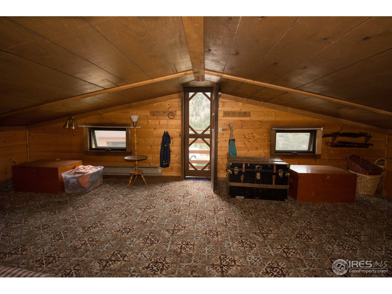1473 Streamside Drive Drake, CO 80515 - Photo 15 of 24 a living room with furniture and a window