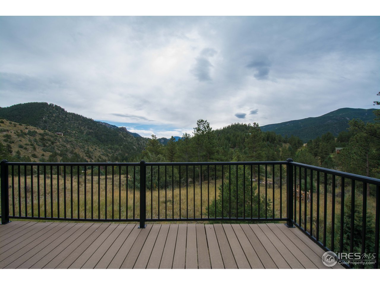 1473 Streamside Drive Drake, CO 80515 - Photo 18 of 24 a view of balcony with wooden floor