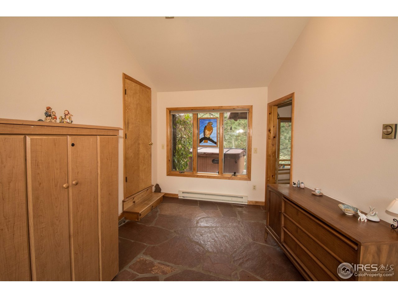 1473 Streamside Drive Drake, CO 80515 - Photo 2 of 24 a view of an empty room and window