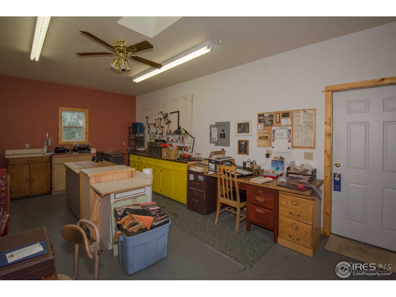1473 Streamside Drive Drake, CO 80515 - Photo 23 of 24 a living room with furniture and flat screen tv