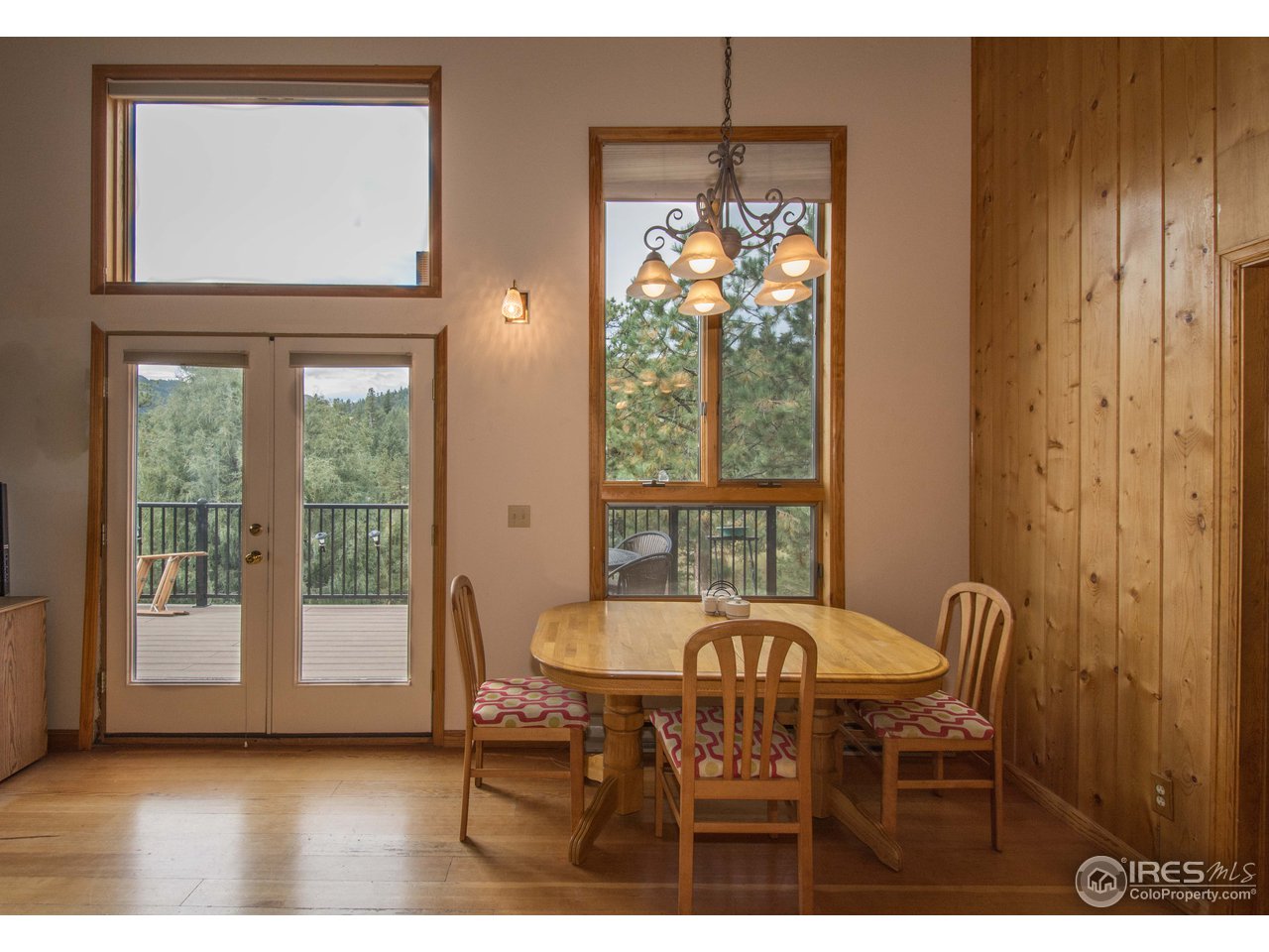 1473 Streamside Drive Drake, CO 80515 - Photo 9 of 24 a view of a dining room with furniture window and outside view
