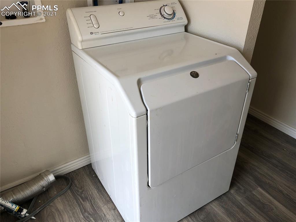 34755 Big Springs Road Yoder, CO 80864 - Photo 22 of 29 a bathroom with a sink and a washer dryer