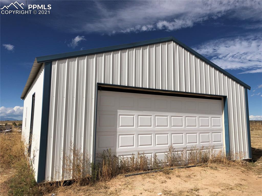 34755 Big Springs Road Yoder, CO 80864 - Photo 25 of 29 a front view of a house