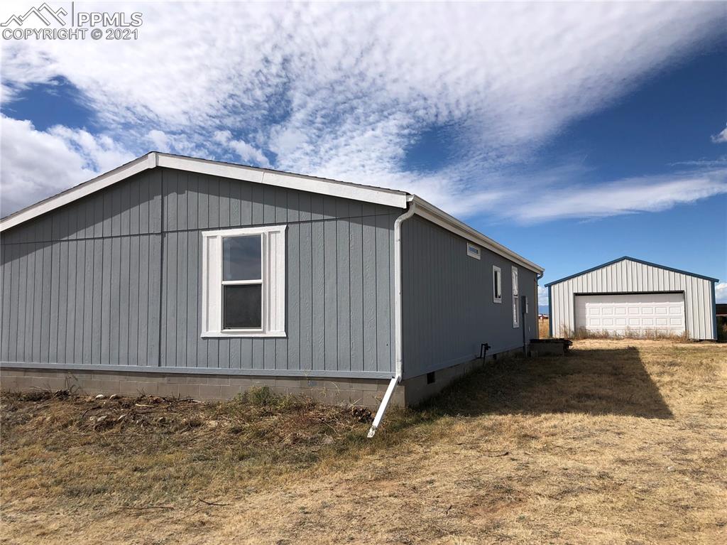 34755 Big Springs Road Yoder, CO 80864 - Photo 27 of 29 a backyard of a house