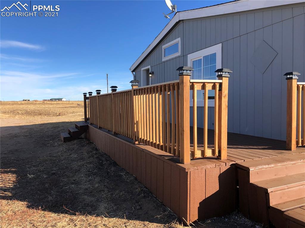 34755 Big Springs Road Yoder, CO 80864 - Photo 6 of 29 a view of outdoor space and deck
