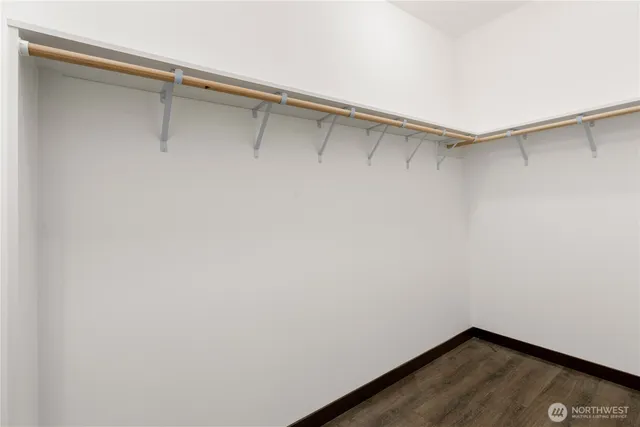 a view of a room with shelf on the wall