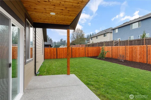 a view of backyard with green space