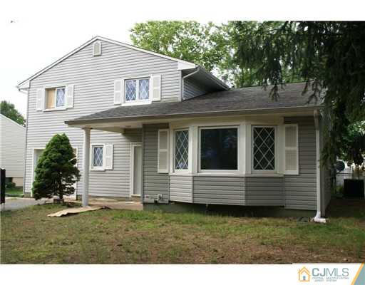 26 Gramercy Road Old Bridge, NJ 08857 - Photo 1 of 14 a view of house with a yard