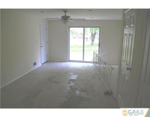 26 Gramercy Road Old Bridge, NJ 08857 - Photo 12 of 14 a view of an empty room with a window