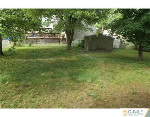 26 Gramercy Road Old Bridge, NJ 08857 - Photo 14 of 14 a view of a garden