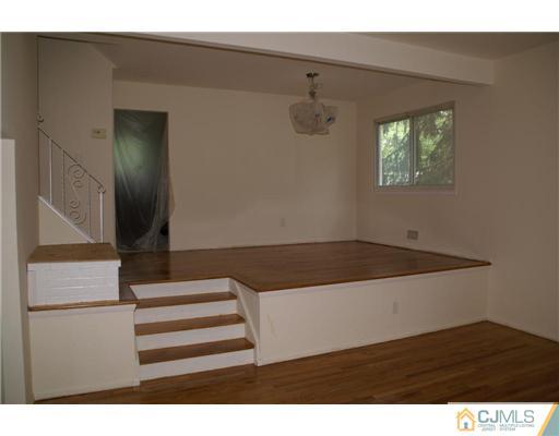 26 Gramercy Road Old Bridge, NJ 08857 - Photo 3 of 14 a view of entryway with wooden floor