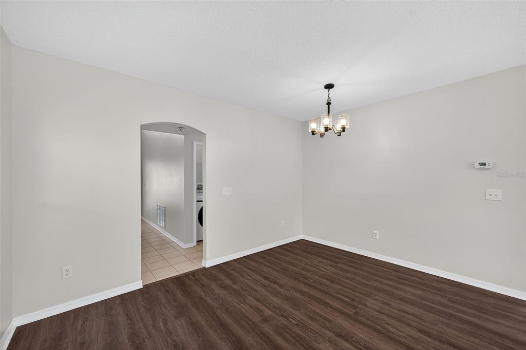 28632 Seashell Court Wesley Chapel, FL 33545 - Photo 12 of 60 wooden floor in an empty room