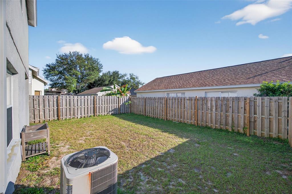 28632 Seashell Court Wesley Chapel, FL 33545 - Photo 45 of 60 a view of a backyard