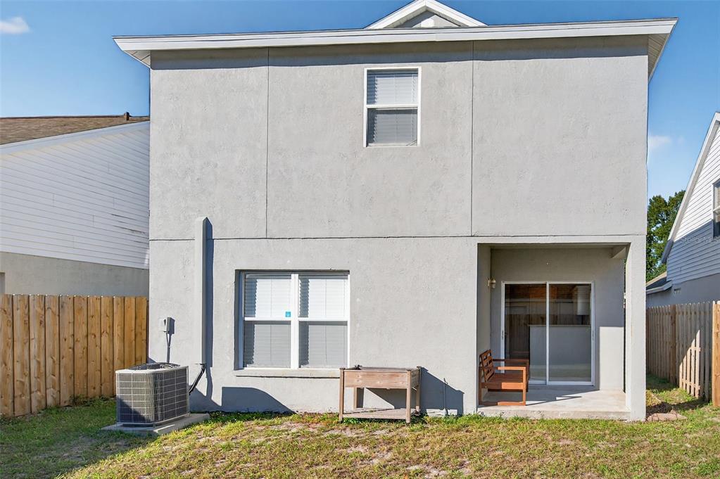28632 Seashell Court Wesley Chapel, FL 33545 - Photo 48 of 60 a living room with furniture