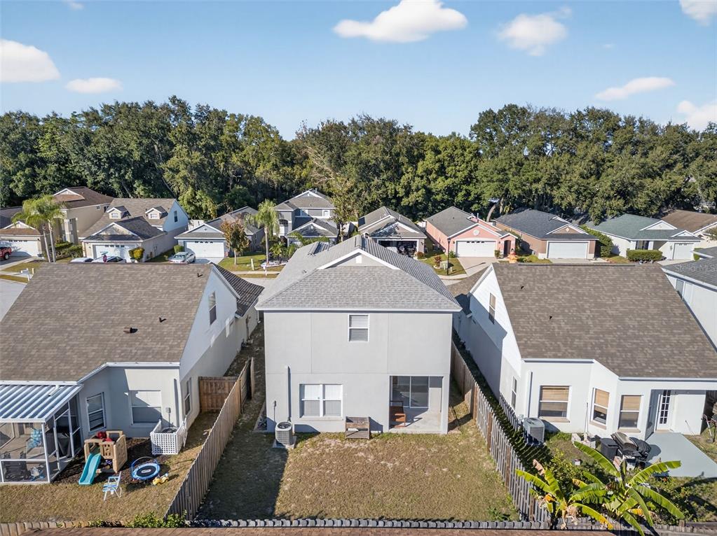 28632 Seashell Court Wesley Chapel, FL 33545 - Photo 60 of 60 a aerial view of a house with a garden